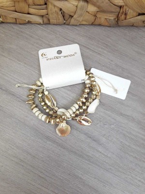 Pulsera dorada conchas